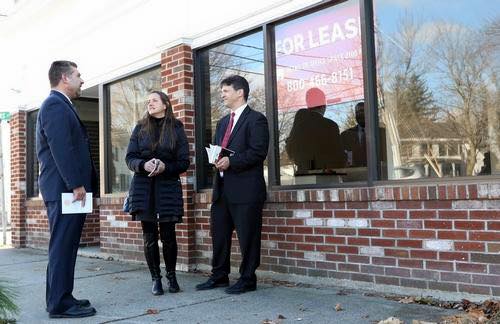 Board members meet for a photo opportunity for a story with the Independent.
